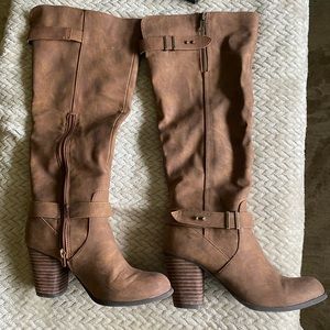 Brown tall heeled boots!